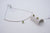 Breuning sterling silver Peridot curved bar necklace